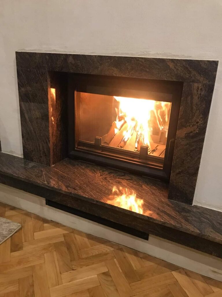 Șemineu placat cu piatră naturală – lucrare Kawa Stone